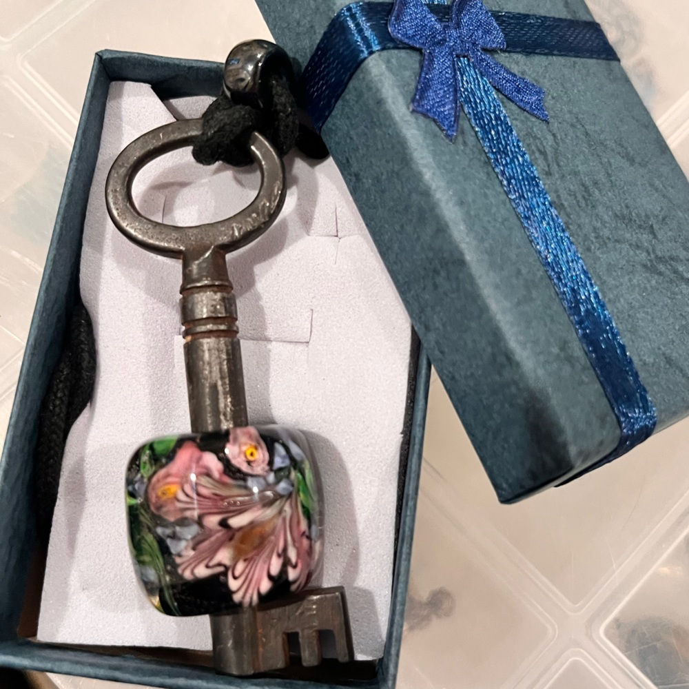 N128 Vintage Key Pendant with Glass Blown Bead encompassing it